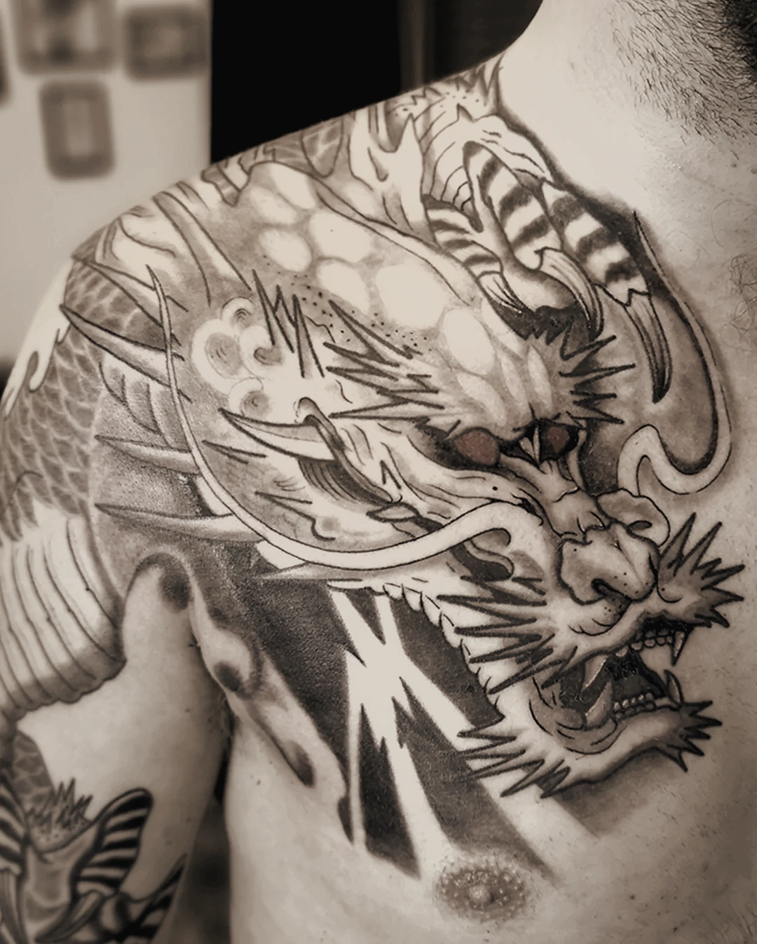 Dragon chest tattoo Osijek — Seifert Tattoo